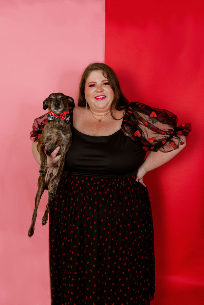 Plus size Valentine's day midi skirt with velvet red hearts and a plus size Valentine's day puff sleeve top with glitter red hearts.